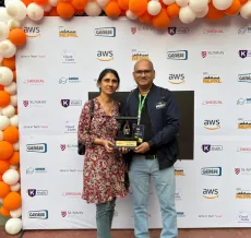 Receiving an award at an AWS event